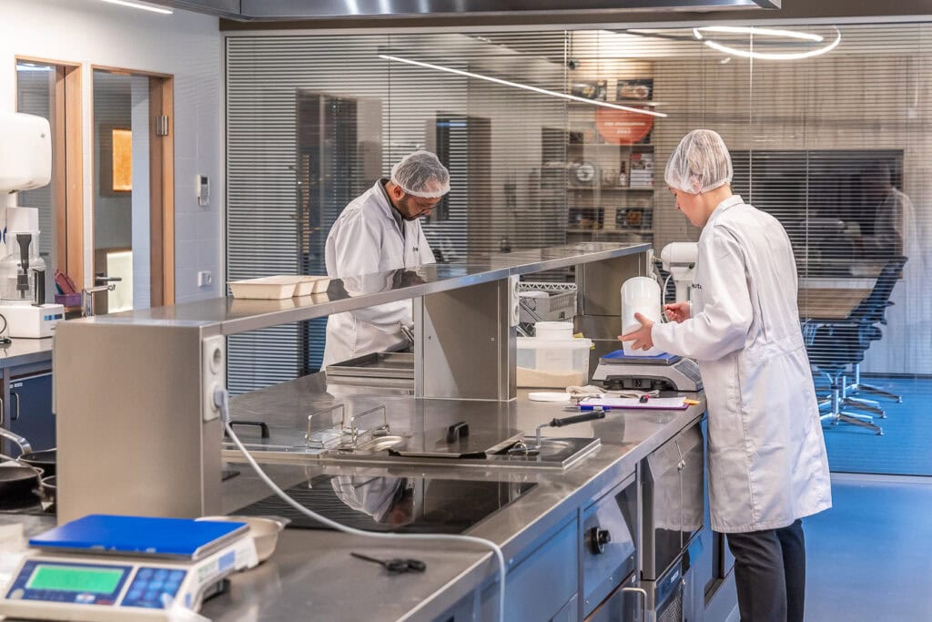 Schouten Europe team members working on plant-based product development in the test kitchen