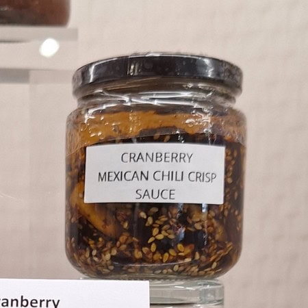 Cranberry Mexican chilli crisp sauce combines sweet, spicy and crunchy.