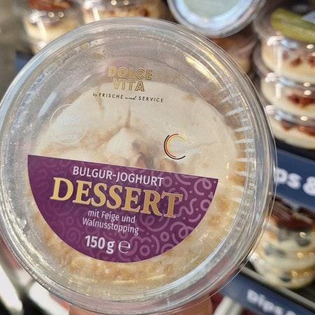 Bulgur yoghurt dessert with fig and walnut topping for added texture.