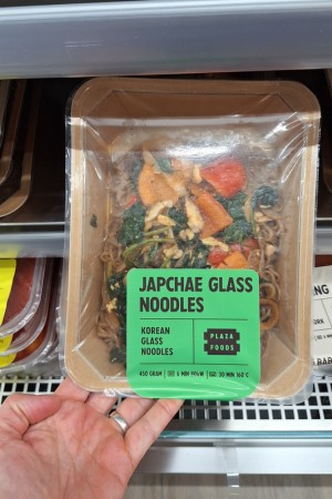 Japchae glass noodles as a complete meal solution inspired by Korean cuisine.